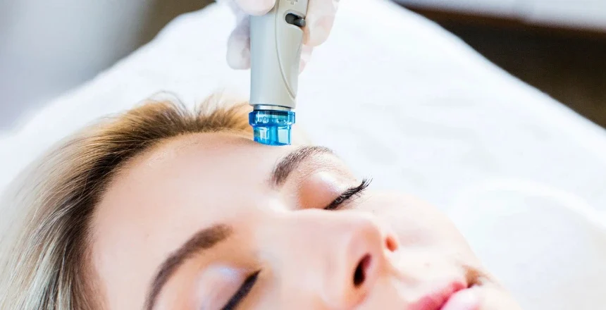 Professional HydraFacial® treatment in progress at a Toronto based medical beauty clinic, showing advanced skincare technology being used for healthy and glowing skin.